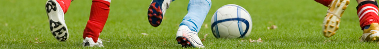 boys playing football