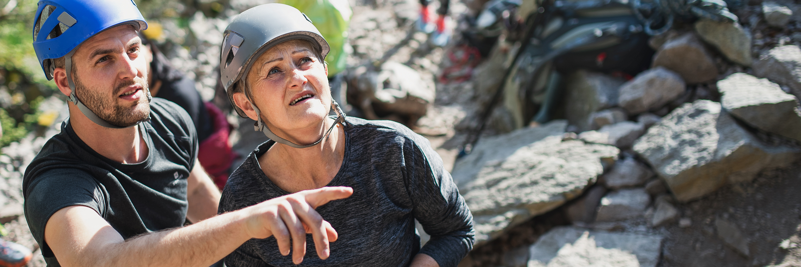 an instructor explaining a climb to a climber